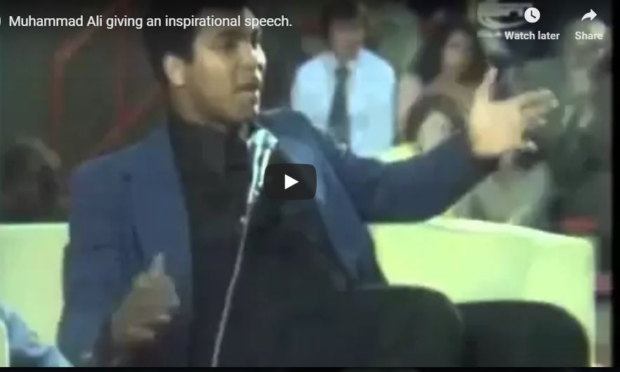 Muhammad Ali giving an inspirational speech.
